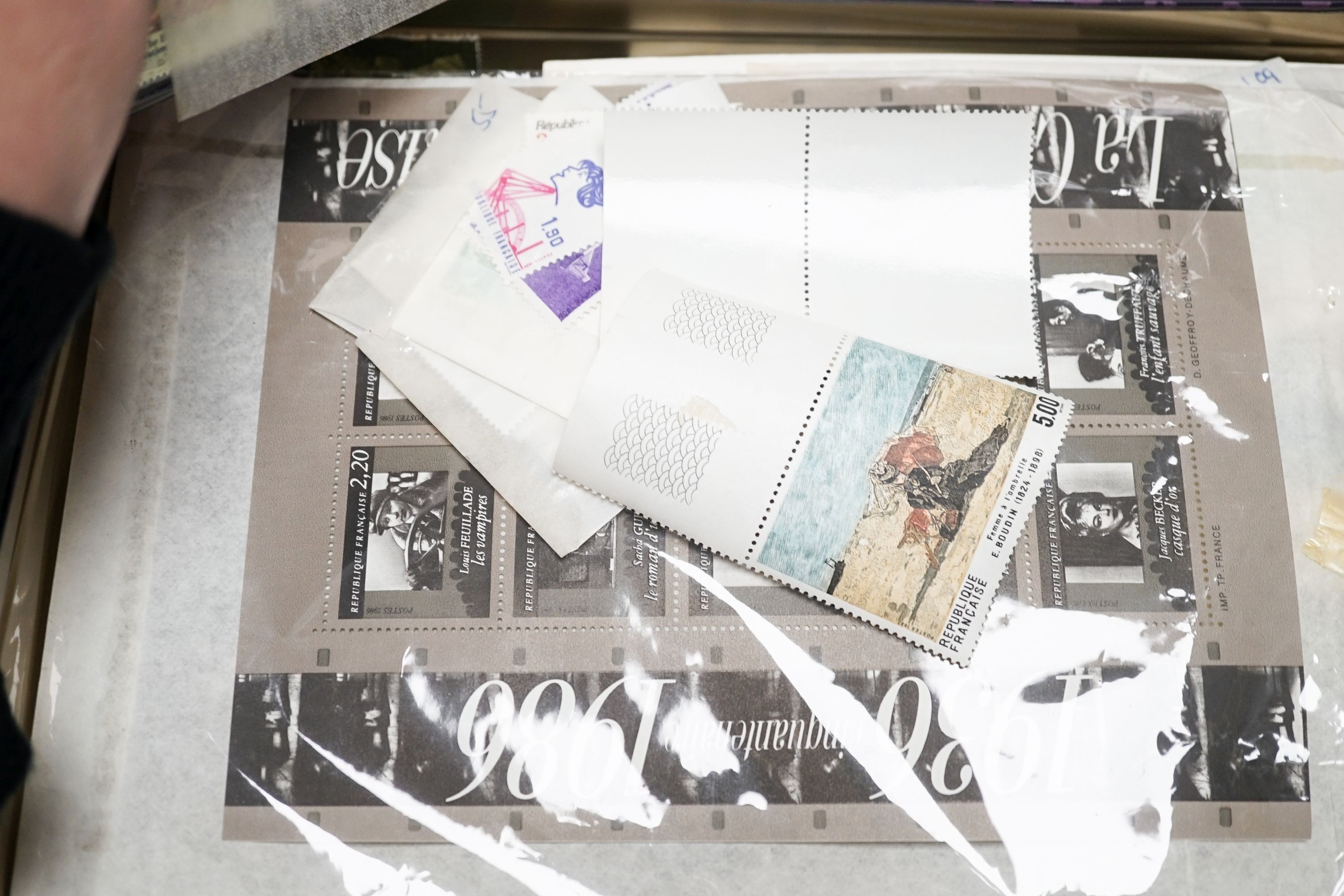 A large collection of world stamps in albums with Great Britain 1840 1d black (2) 2d blue (faults) presentation packs, FD covers, New Zealand, France (six boxes) In the front 'post' office